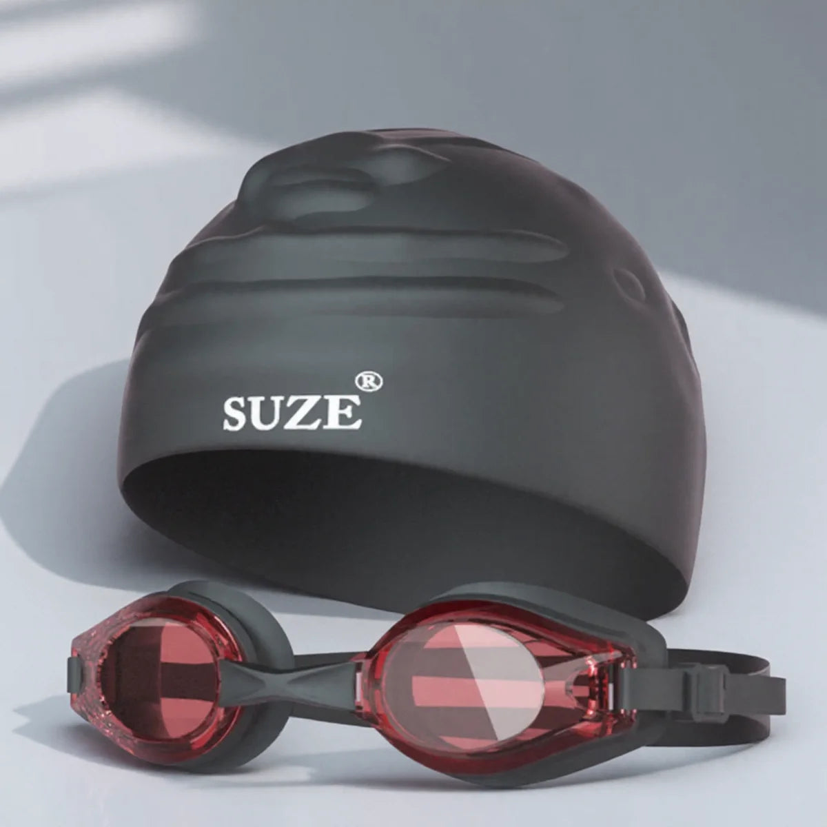 High Definition Anti Fog Swimming Goggles with Comfortable Silicone Seal Includes Swim Cap and Storage Box